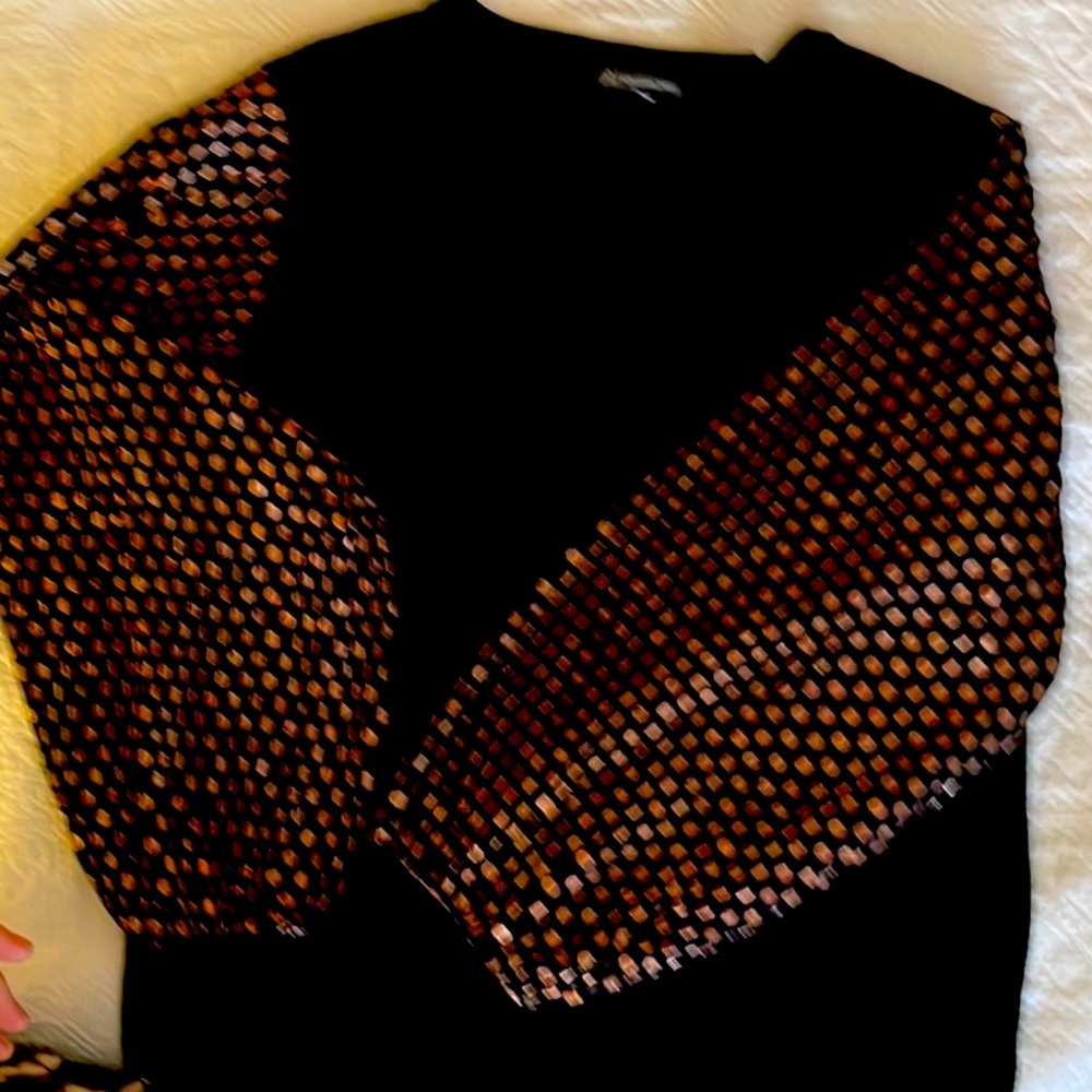 Black sweater with copper polka dot sleeves
